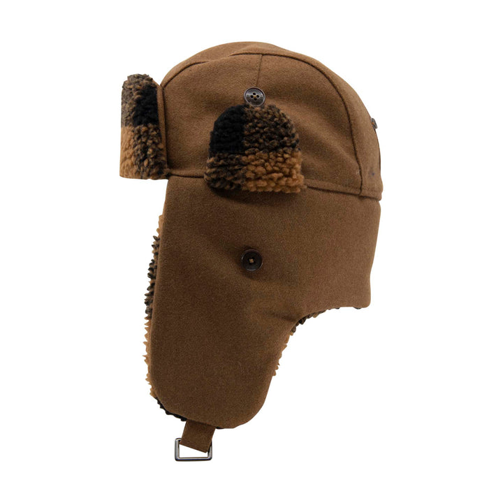 Brown winter hat with ear flaps on a white background